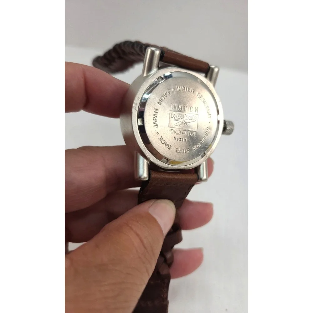 Reebok Sport Men's 100m Silver Round Leather Band Analog Quartz Watch